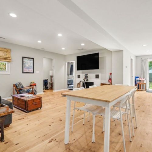 Open-concept kitchen, dining, and living room.