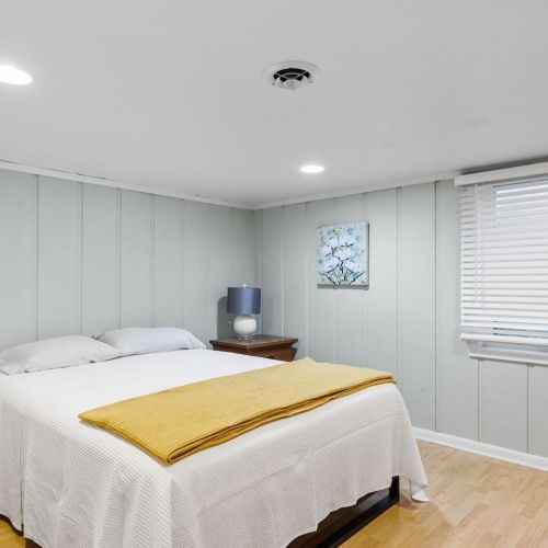 Bedroom in basement with egress window
