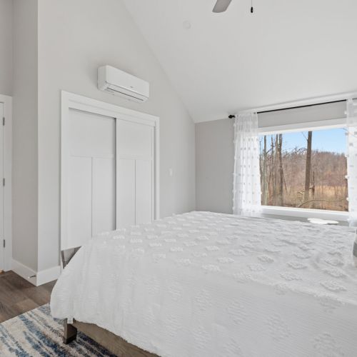 Another view of the primary bedroom.