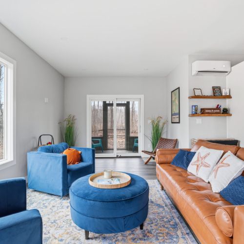 Living room to the screened in porch.