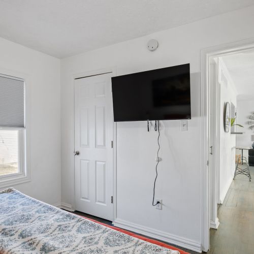 Bedroom with Smart TV and Closet