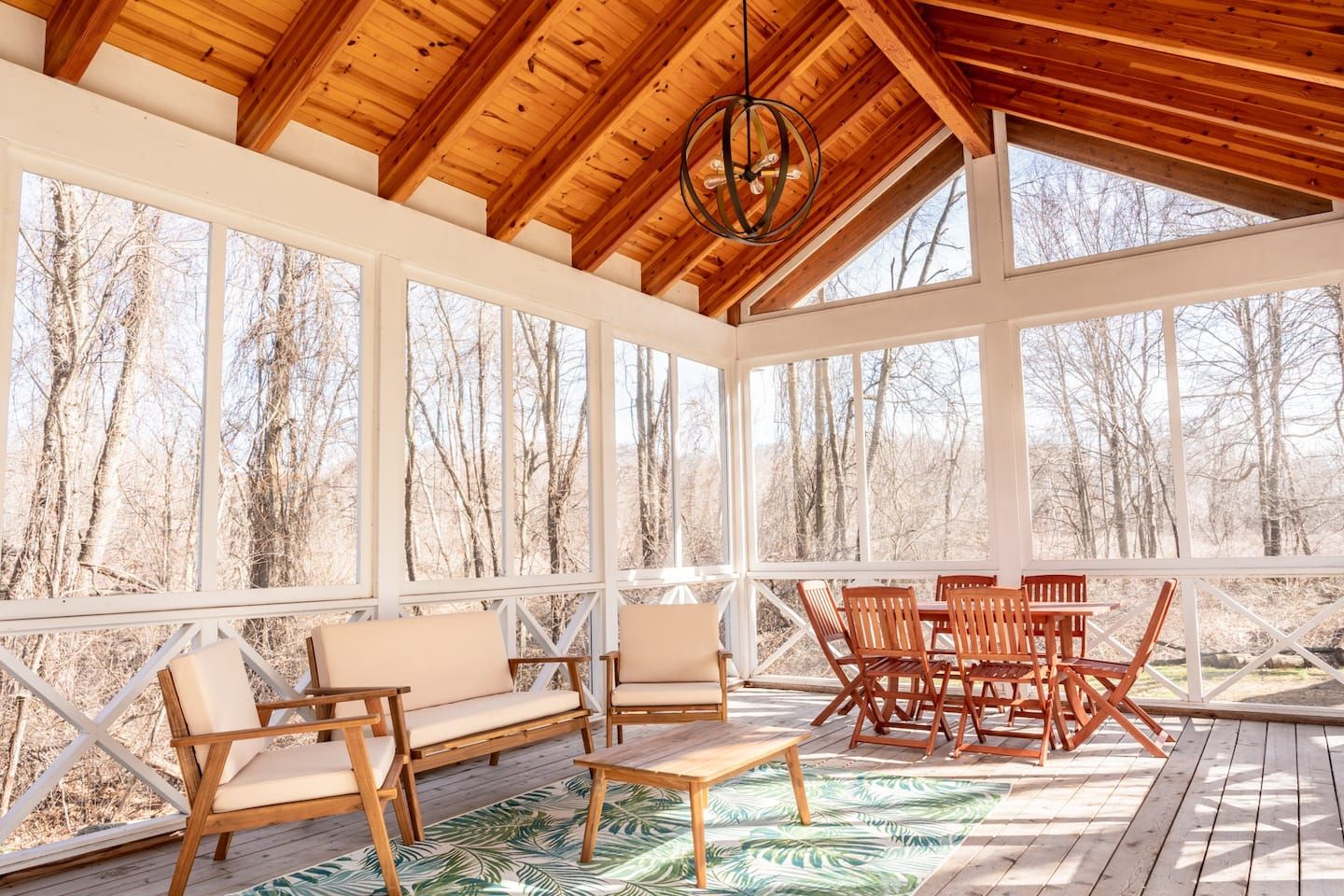 The fully screened-in porch could well be the most popular room in the house, especially when you see the views.