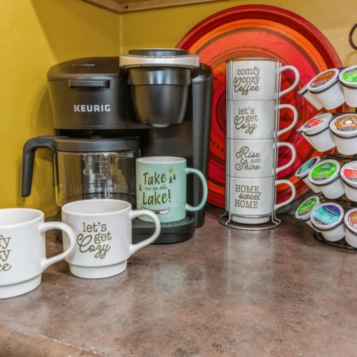 Keurig 
Uses Kcups or Ground Coffee (Supplied)