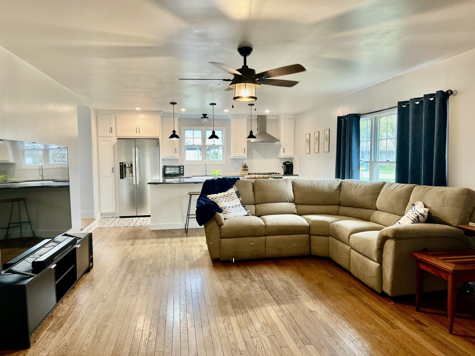 Open concept living room / kitchen.  There is large island with 2 bar stools for entertaining.