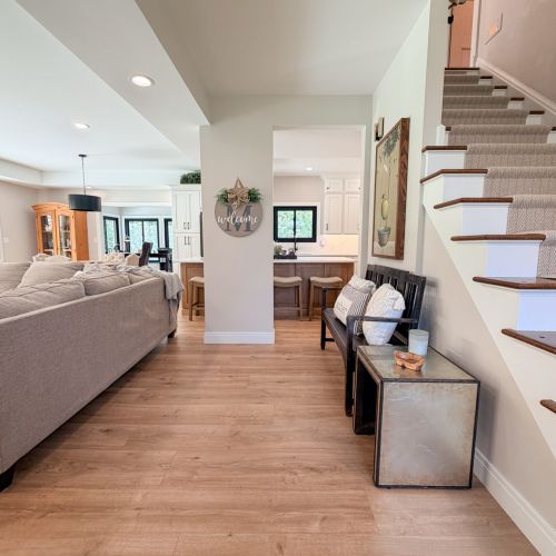 Welcoming entryway with access to the home's upper level.
