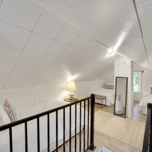 Bedroom 3 has two singles and one double bed.