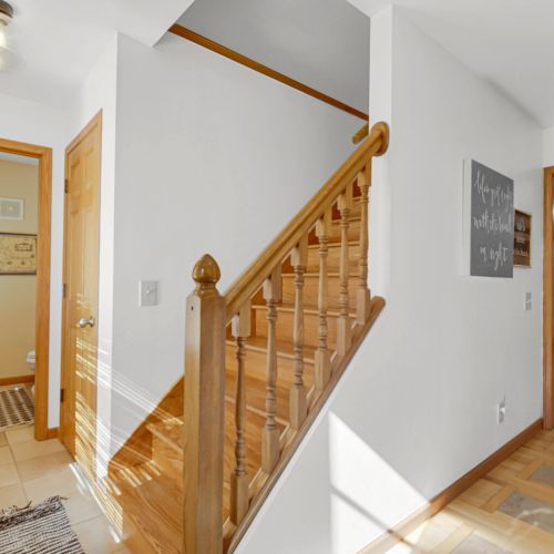 Stairs to second floor with all bedrooms