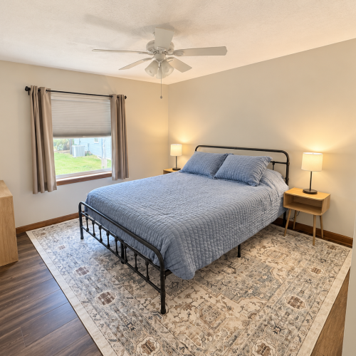 Bedroom 2 – View 2: Additional view of Bedroom 2, showcasing the queen-size bed and room layout.