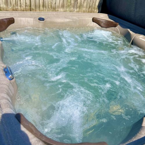 4 person Hot Tub in the back yard.  There is a privacy fence on all sides off the yard.