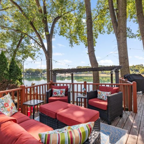 Relax on the comfy outdoor couch, perfect for enjoying the fresh air and campground atmosphere.