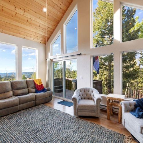 Living Room with beautiful views of Woodland Park