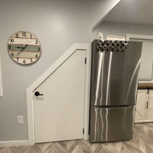 Kitchen with Full Size Refrigerator and Pantry