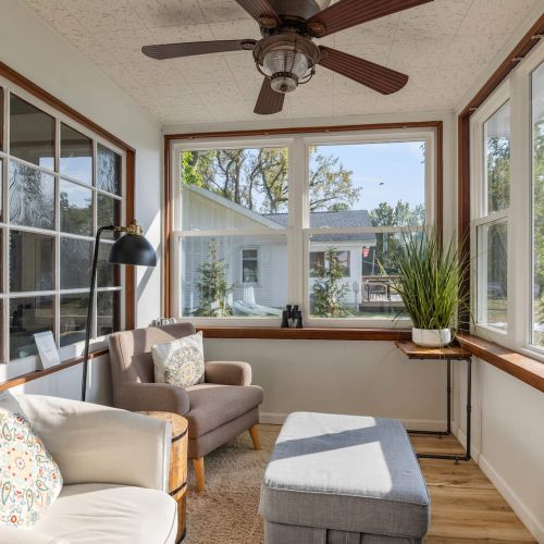 Porch with seating area overlooking the lake