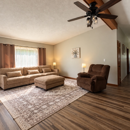 Second view of the living room showing the layout.