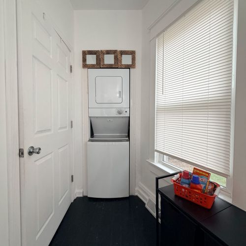 Convenient in-unit washer and dryer available for guests in the lower unit.