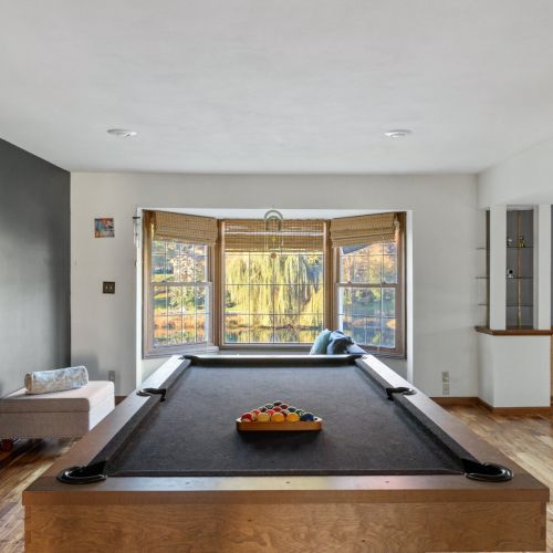 Recreation space with pool table — ideal for gatherings and fun nights in.