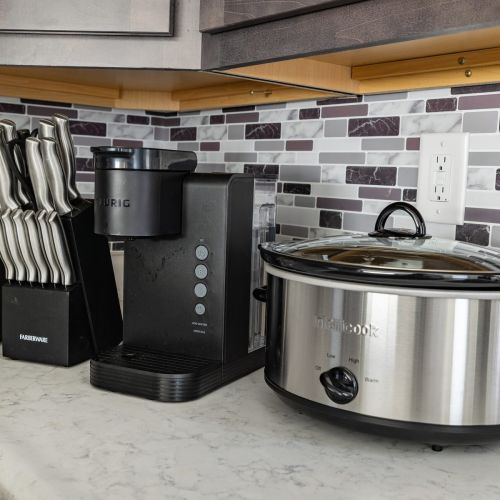 Kitchen is fully equipped with toaster, knife set, Keurig & Crock Pot
