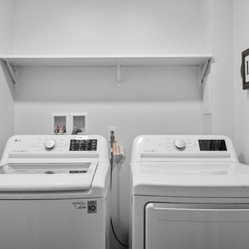 Laundry room with washer and dryer