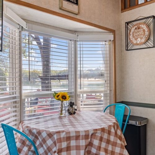 Enjoy meals at the two-top dining table with beautiful views of the lake right from the window.