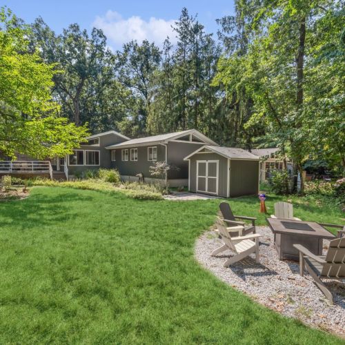 Beautiful Backyard with Fire Pit and Seating