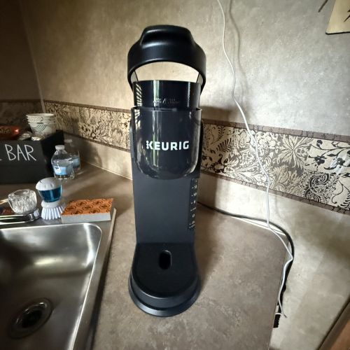 Convenient Keurig coffee maker, perfect for brewing a quick cup anytime.