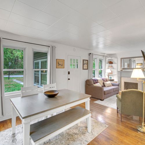 Open concept dining room and living room.