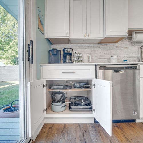 Kitchen stocked with pots and pans.
