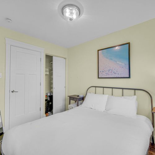 Guest Bedroom 1, closet and doorway view.