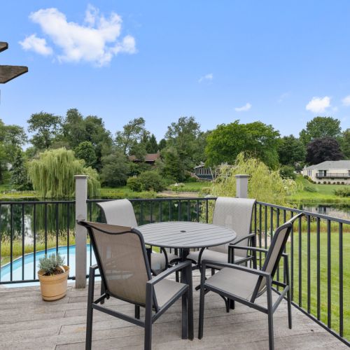 Table and chairs on the deck.