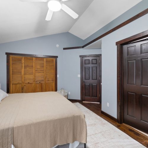 Bedroom 1 - another view of doors and closets.