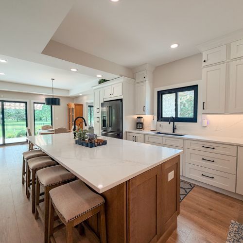 Spacious kitchen featuring an island with bar seating.