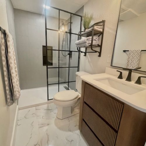 Master Bathroom has a walk-in shower, shower faucet with handheld sprayer