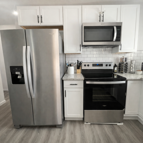 Kitchen with Full Size Refrigerator, Stove & Microwave