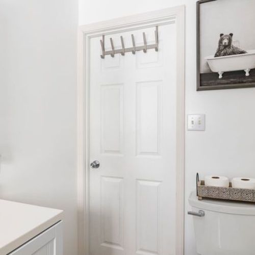 Another view of the bright white bathroom.
