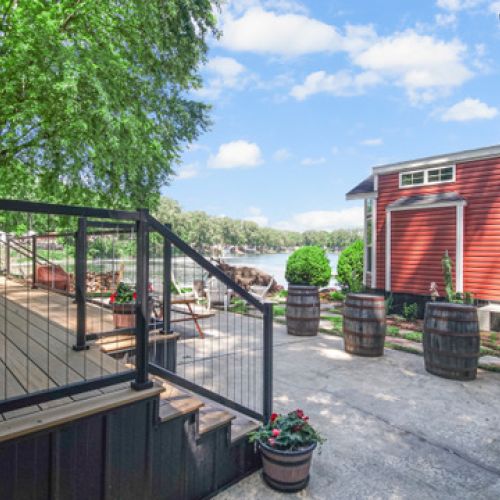 Gorgeous view of lake with plenty of seating for relaxation with friends & family