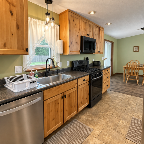 Second view of the kitchen showcasing the layout and available appliances.