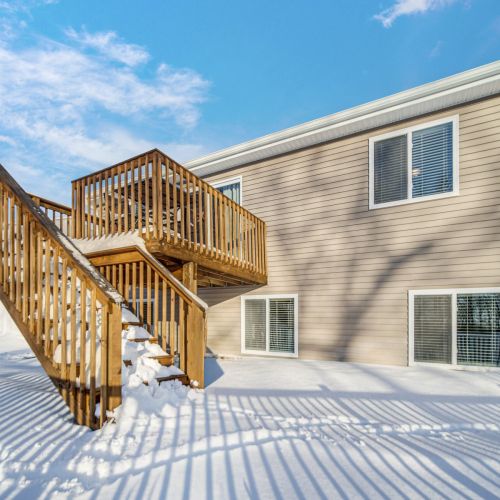 View of the back deck and home from ground level.