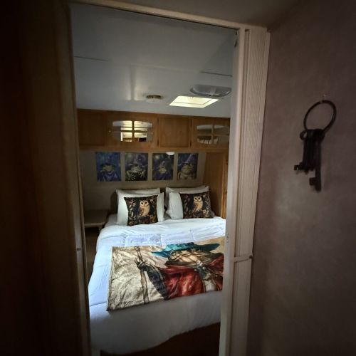 Additional perspective highlighting the trailer’s sleeping area.