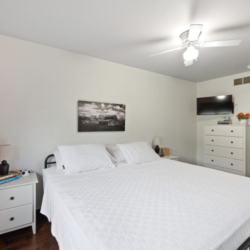 Bedroom 2 - Another view with TV and dressers.