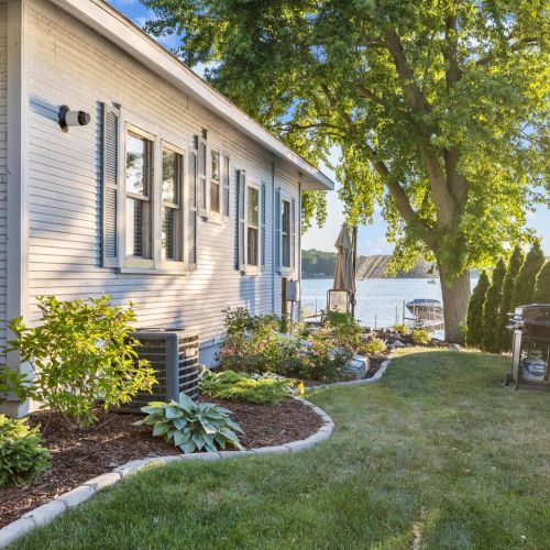 Side yard and garden with grill