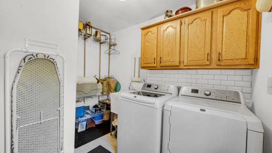 Laundry just off kitchen on main floor