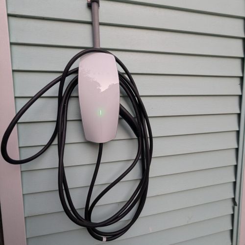 Free driveway parking for multiple vehicles, plus a convenient EV charger for electric vehicles.
