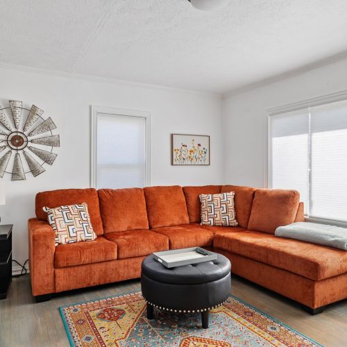 Living Room with Sectional Sofa, Ottoman with Storage, Side Table with USB ports