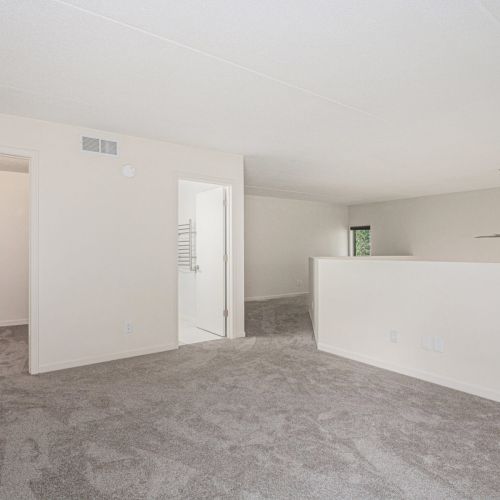 This is the area upstairs with a view of bathroom 1.