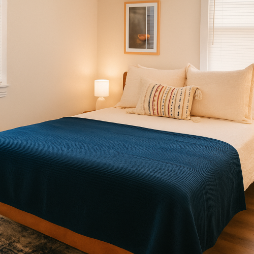 Bedroom with Queen bed, Smart TV, Two side tables, Two table lamps, Ceiling Fan & Rug