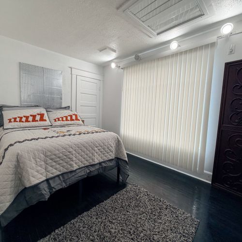 Upper Unit - Master bedroom with a full bed.
