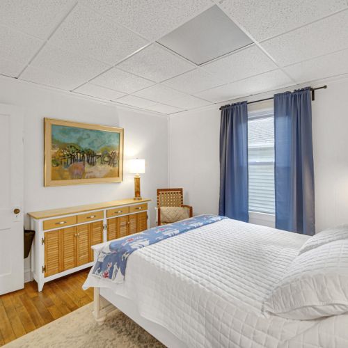 Bedroom 1 with a queen bed.