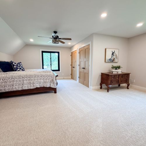 Inviting queen bedroom 2 with space to relax and settle in.