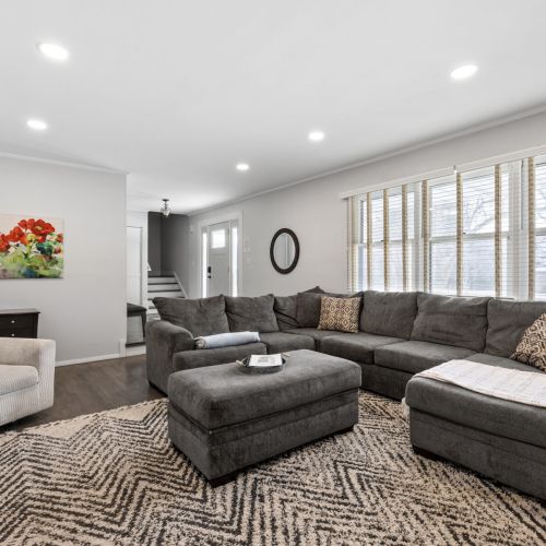 Sectional couch with tv, games, and a desk for working space. Beware of step down