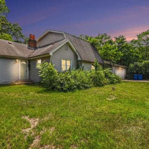 Front of the home at dusk.